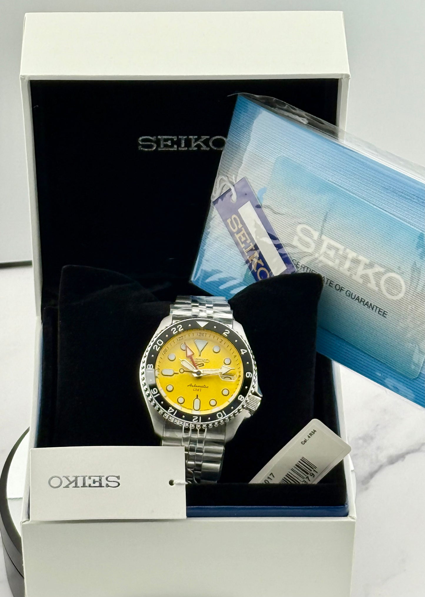 New Full-Set Seiko 5 Sports SKX GMT SSK017 Yellow Dial Bruce Wayne Bezel